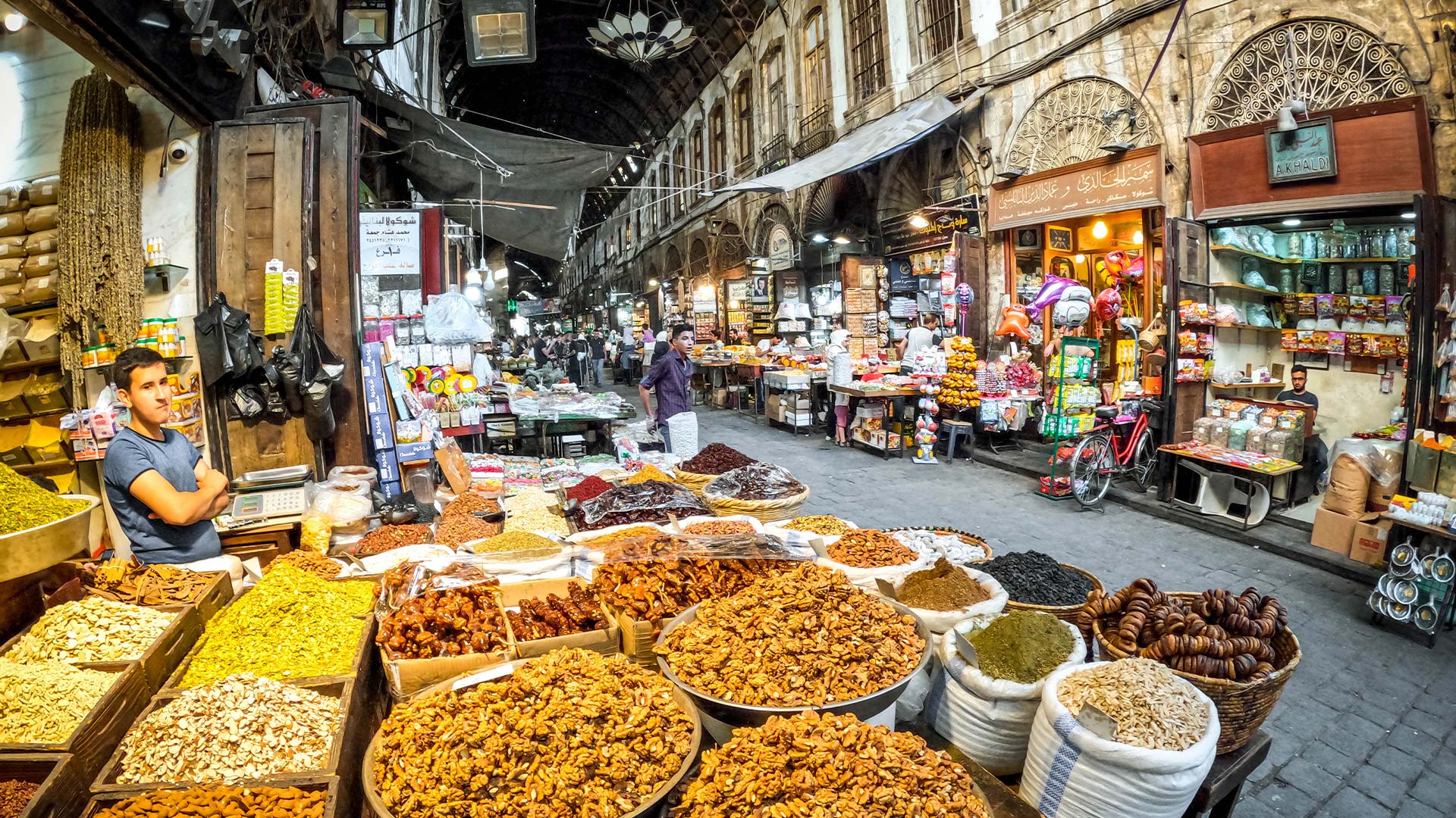 Spices Shop in Souq al-Hamidiyeh with the seller standing in the background welcoming shoppers.