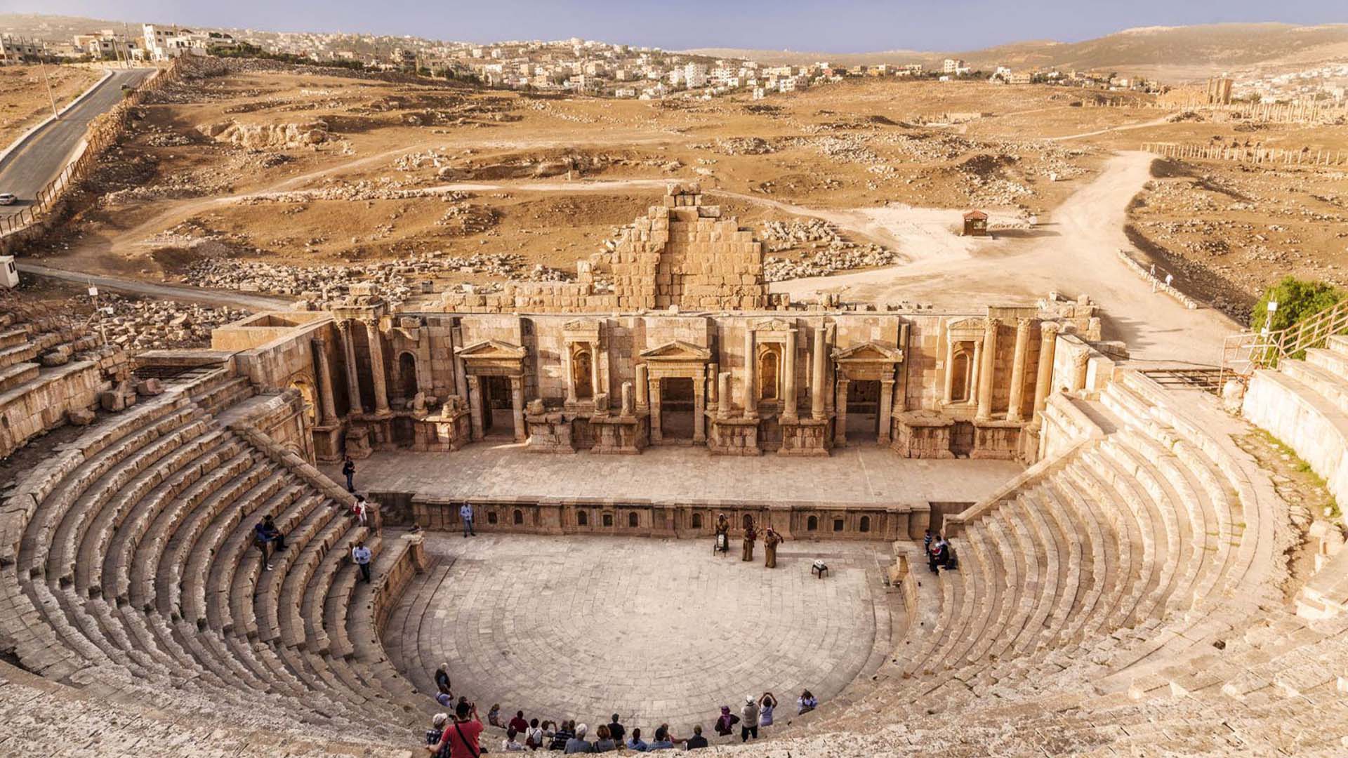 A panoramic photograph immortalizes the captivating Theater of Jerash, where visitors immerse themselves in the spellbinding performance of traditional musicians.