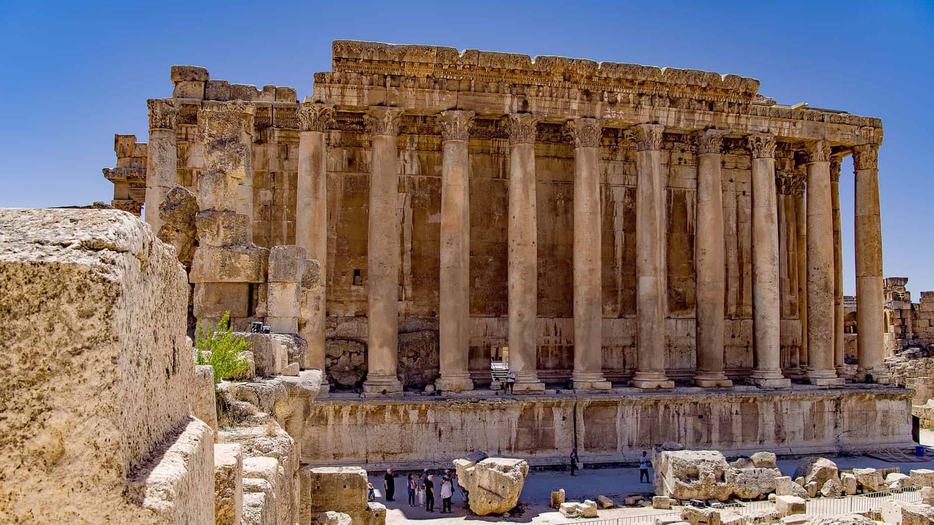 A photograph immortalizes the Temple of Bacchus in Baalbek, a striking testament to the magnificent architectural achievements of the Roman Empire.