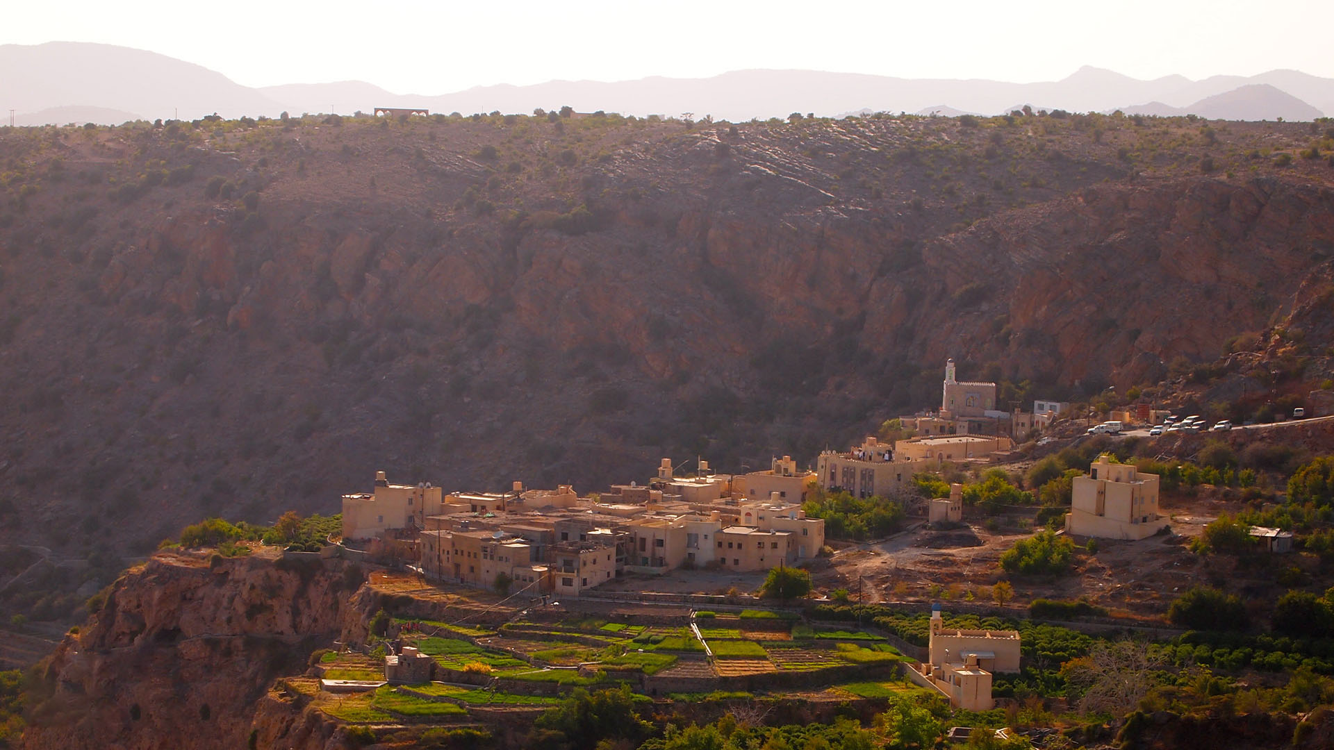 A panoramic photograph showcases the captivating beauty of Jebel Akhdar, blessed with picturesque natural landscapes that captivate the senses.