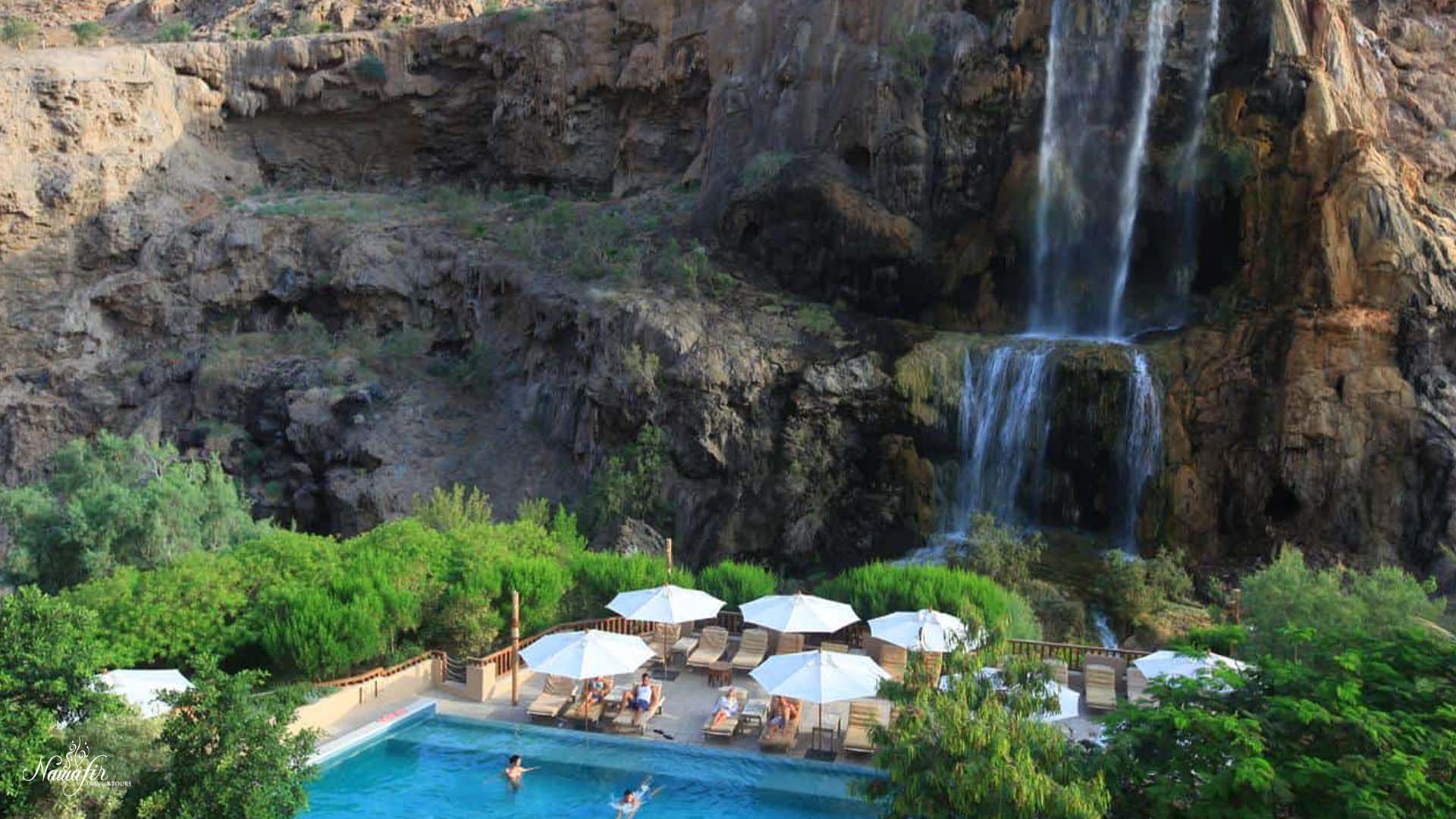 Ma’in Springs: A photograph immortalizes the picturesque Ma'in Springs, nestled within the serene Dead Sea Valley, as cascading waterfalls form a captivating backdrop.